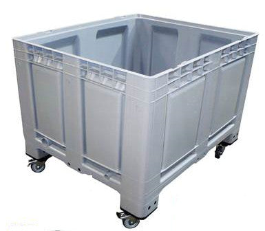 Skrzyniopaleta plastikowa pełna szara na stopach i kołach wym. 1200x1000x790 mm